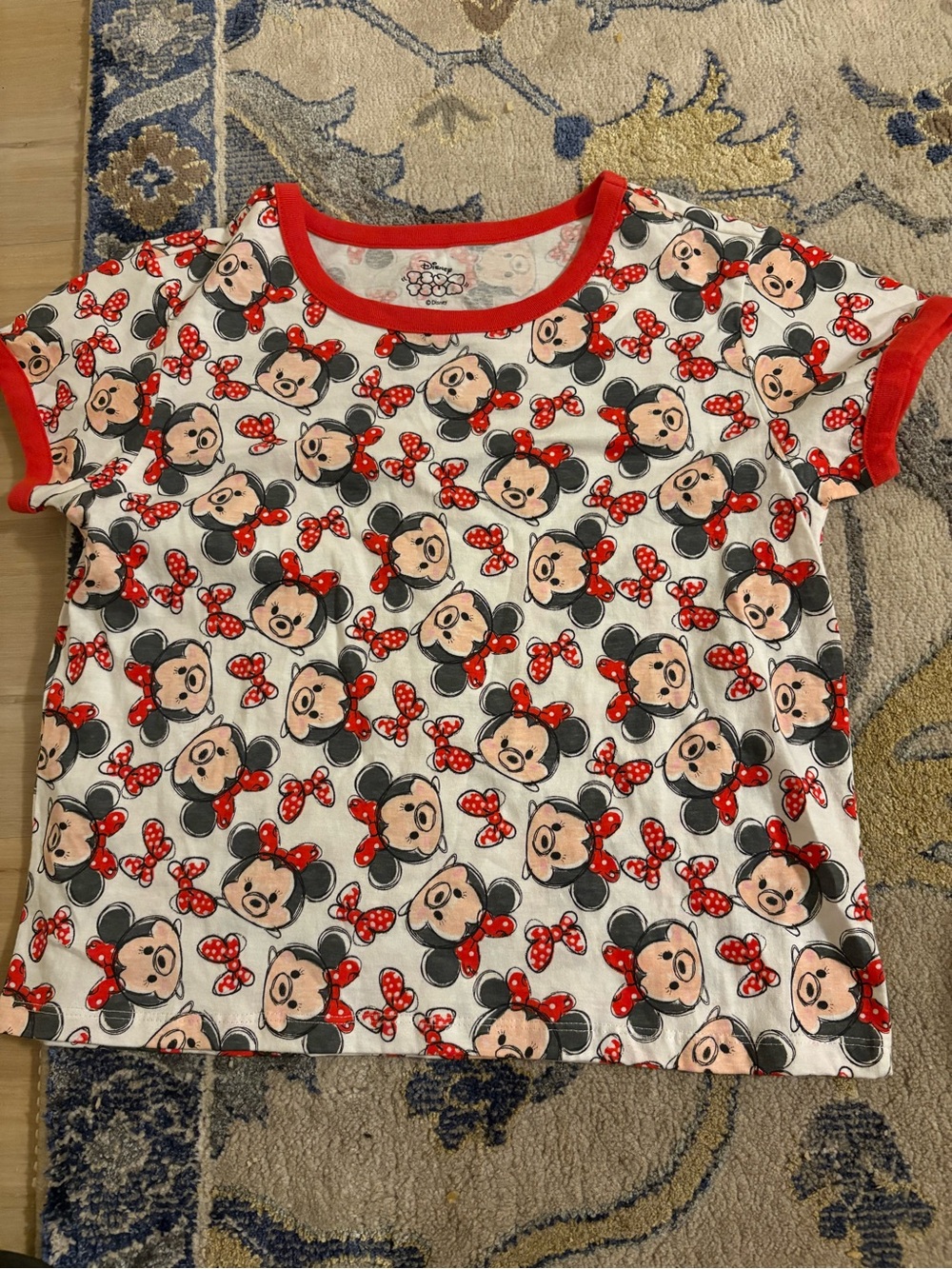 Disney Minnie Mouse cotton baby tee with repeating pattern of Minnie Mouse faces